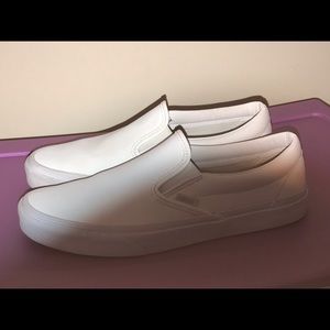 All white leather vans.